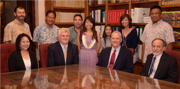 (l. to r.) front row:  Justice Nakayama, Chief Justice Recktenwald, Kelsey Uyeda, Justice Wilson, Justice Pollack; back row:  Nathaniel Higa, Rep. Marcus Oshiro, Stuart Uyeda, Kylie Uyeda, Lorene Uyeda, Rudy Domingo