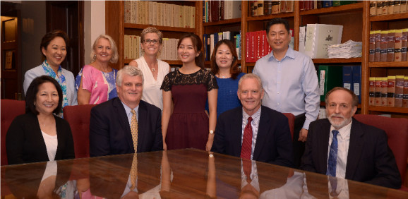 (l. to r.)  front row:  Justice Nakayama, Chief Justice Recktenwald, Ariana Kim, Justice Wilson, Justice Pollack; back row:  Carrie Okinaga, Jennifer Grems, Stephanie Hudson, Sophia and Warren Kim 